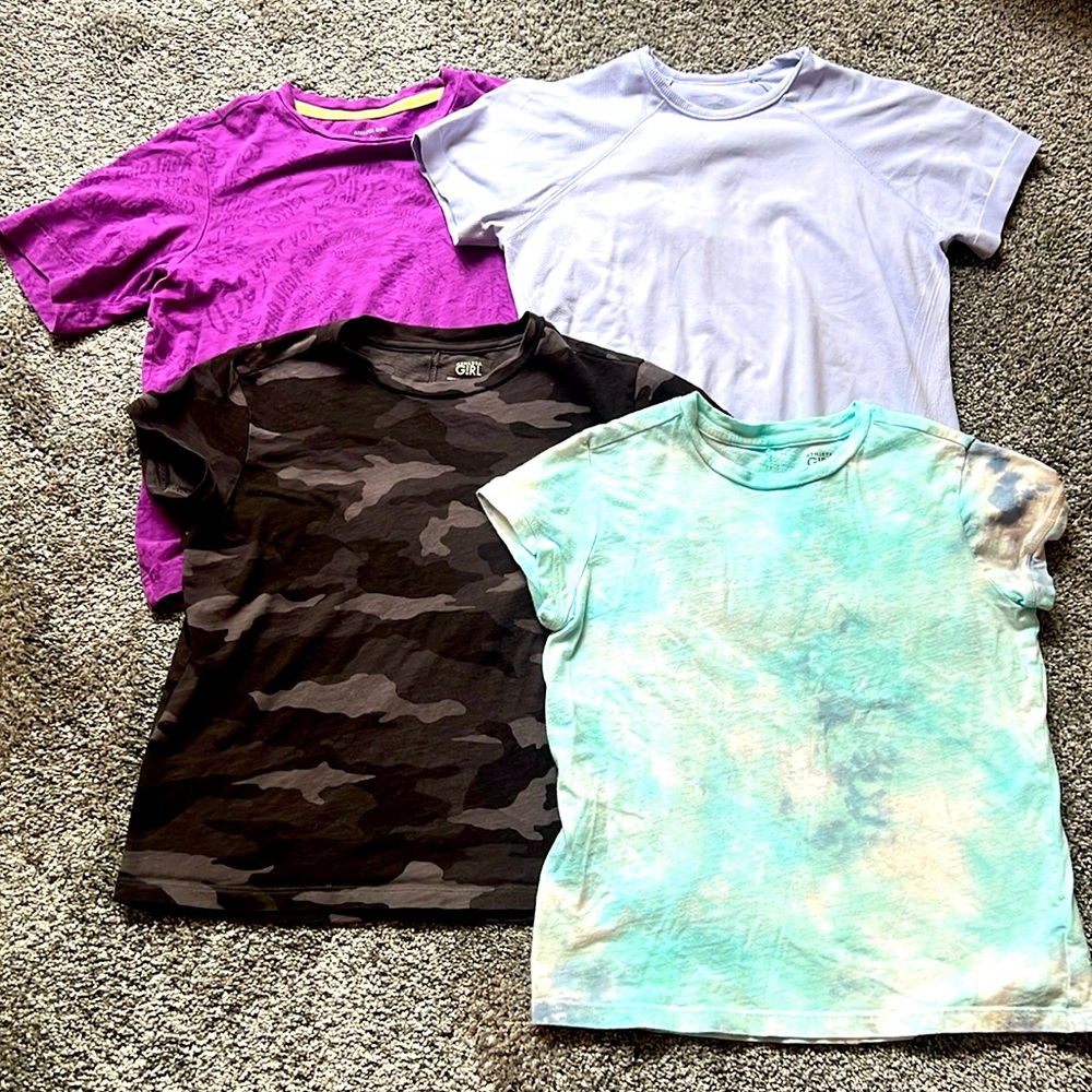 4 athleta girl t- shirts, size M (8-10)